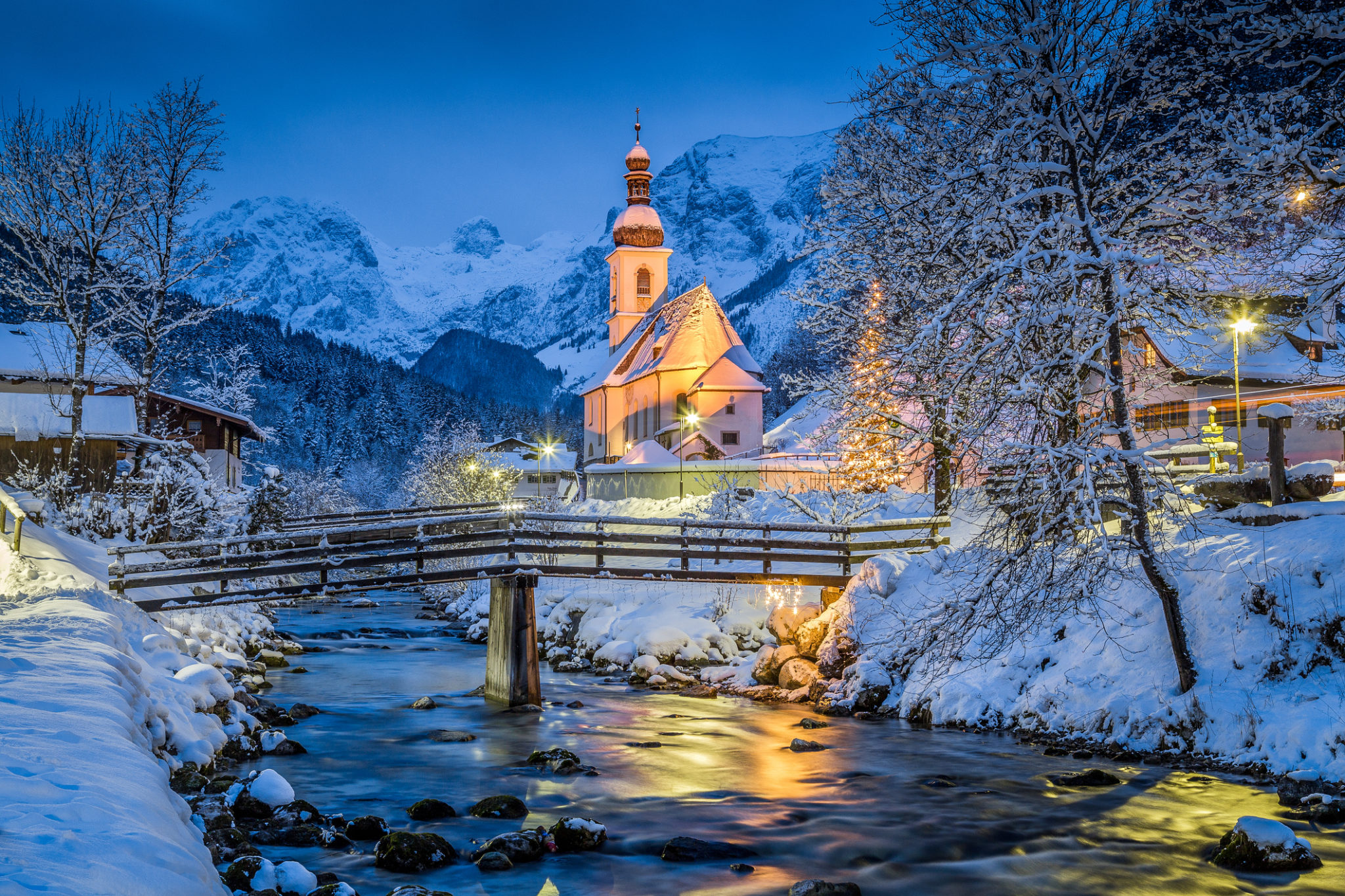 Church of Ramsau in winter twilight, Bavaria, Germany